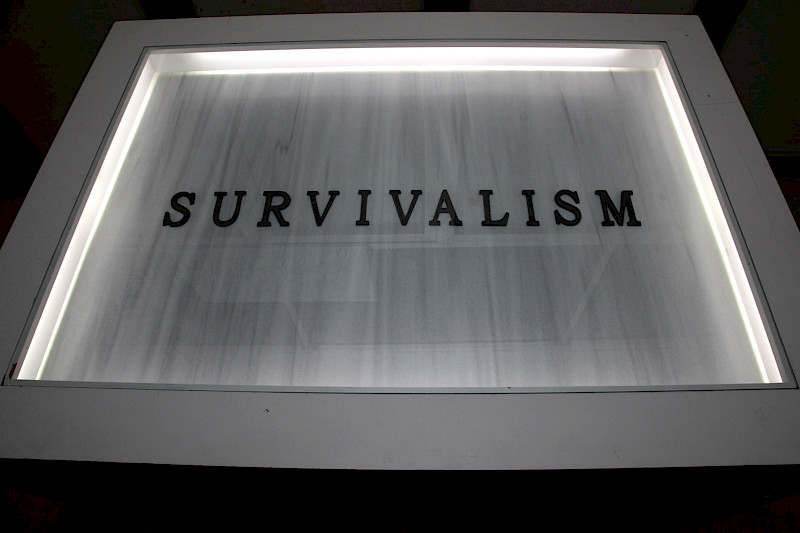 SURVIVALISM (Plaque), 2009, Marble, Brass, Installation View MASA Art Space, Istanbul, Turkey
